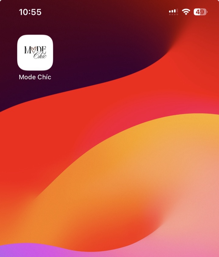 The Mode Chíc app icon on an iPhone home screen